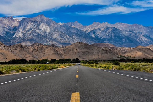 Mountains behind road