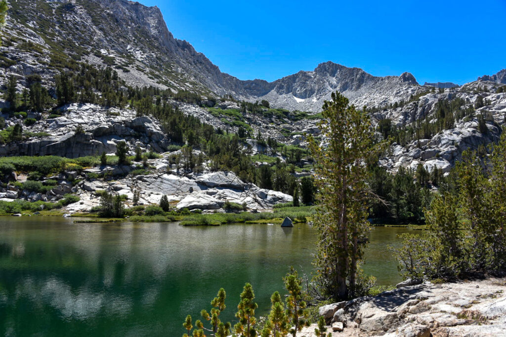 Alpine Lake Surrounded By Mountains