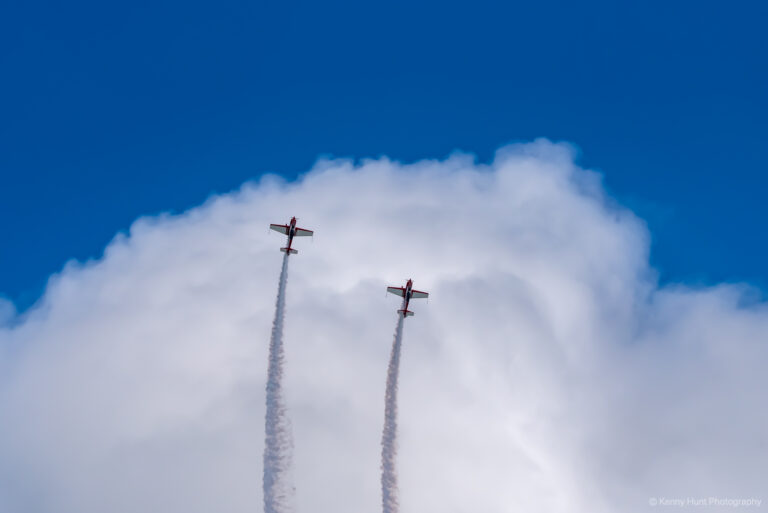 Two Planes doing a inverted roll